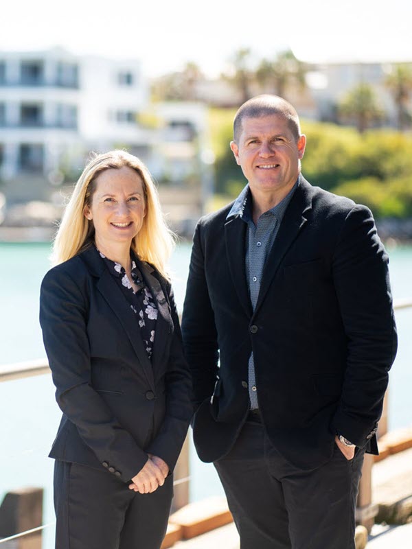 Jessica Andersen and David Sutton from Lotus Legal in front of Perth foreshore.