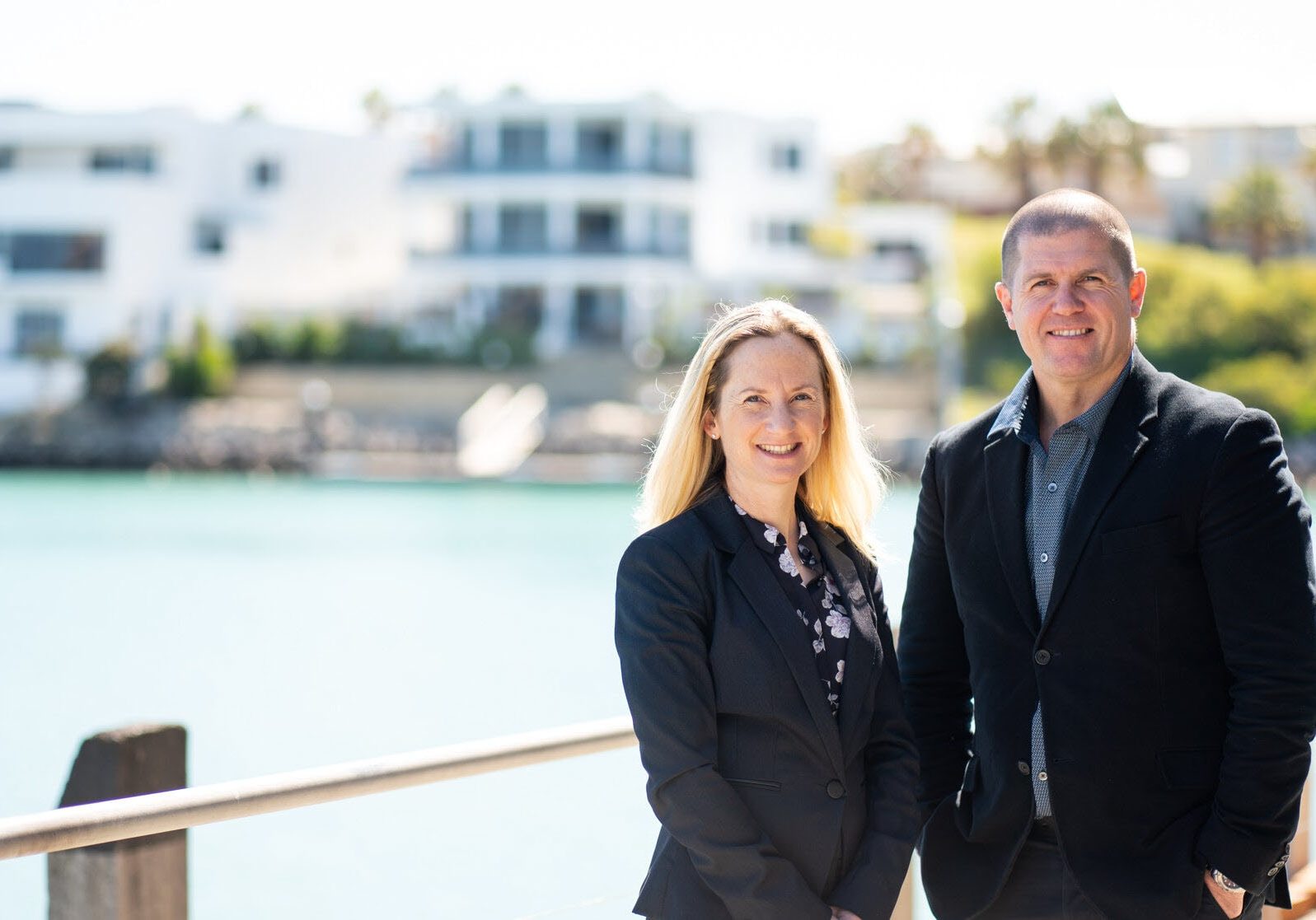 Jessica Andersen and David Sutton from Lotus Legal in front of Perth foreshore.