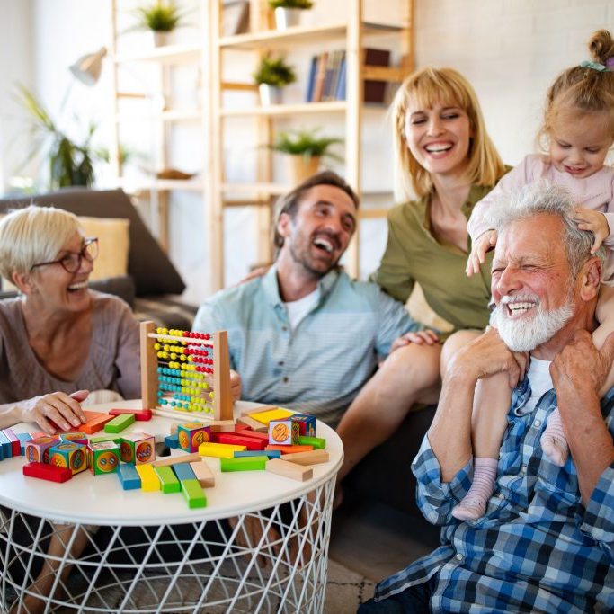 Happy family relaxing after completing their Will.