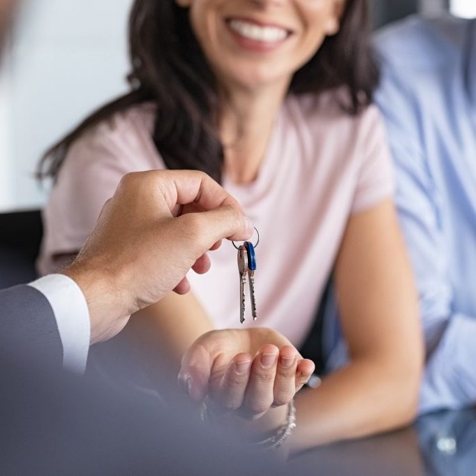 Receiving keys to a home following property settlement in Perth, WA.